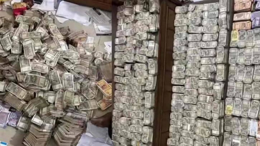 সরকারি কর্মকর্তার বাড়িতে মিলল আলমারি ভর্তি টাকা ও স্বর্ণ সরকারি কর্মকর্তার বাড়িতে মিলল আলমারি ভর্তি টাকা ও স্বর্ণ