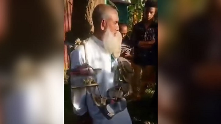 গলায় জুতার মালা ঝুলিয়ে গাছে বেঁধে রাখল মুক্তিযোদ্ধাকে